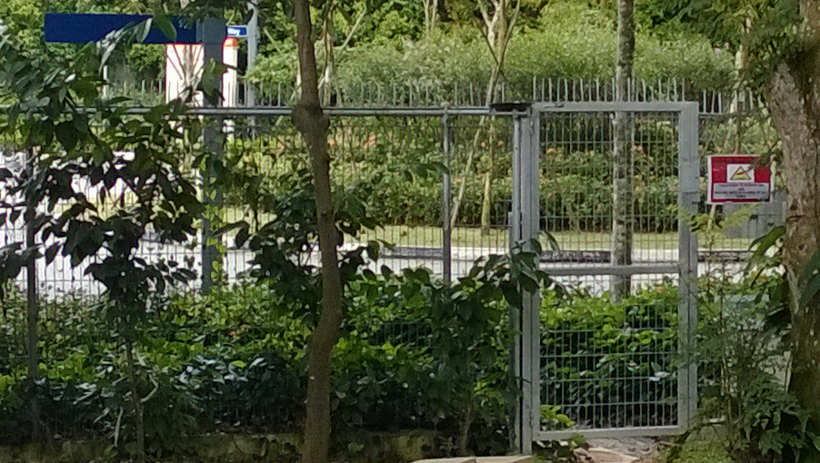 A photo of a gate on the UWCSEA Dover Campus.