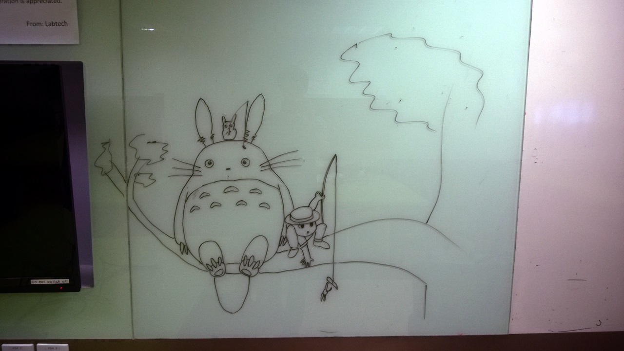 A drawing of Totoro on a whiteboard